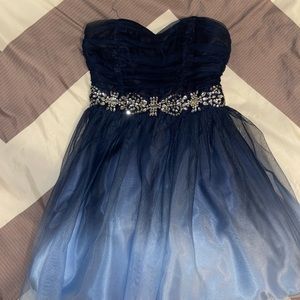Blue ombré strapless homecoming dress with sequin mid line.